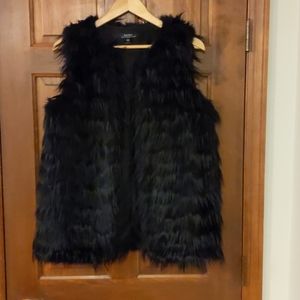 Black faux fur vest